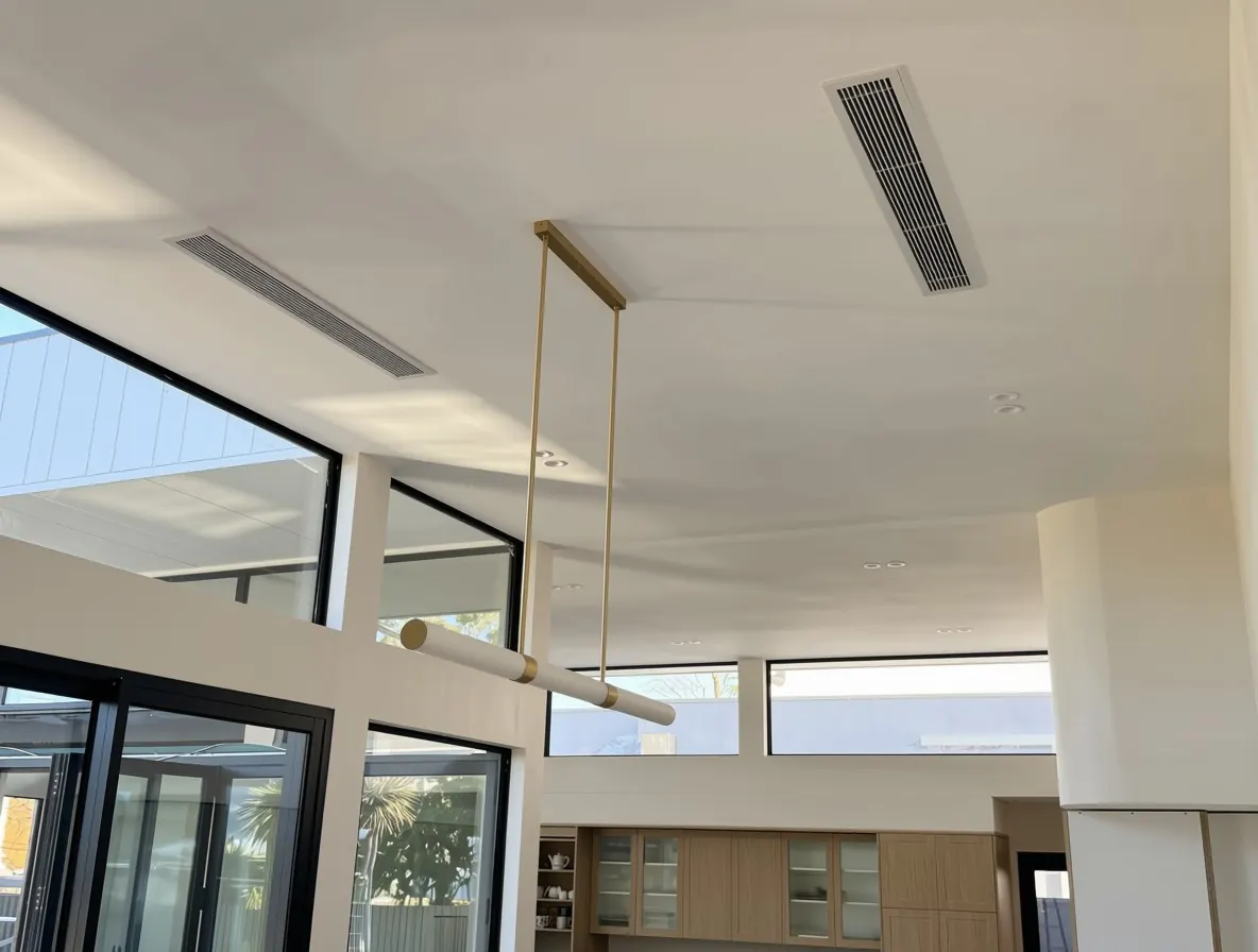 Architectural ducted air conditioning with linear slot diffusers in a premium Sydney home by Evercold